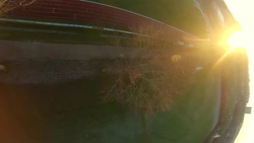 FPV Drone Flight Above The Playing Field Of A Running Track On Sunset