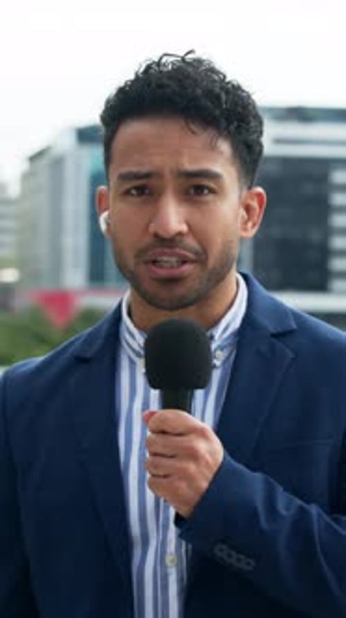 Face, anchor and man with microphone in city, explain story and live coverage for breaking news