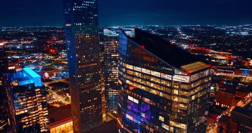 Flight around high-rise modern beautiful buildings in the downtown Houston, Texas, USA.