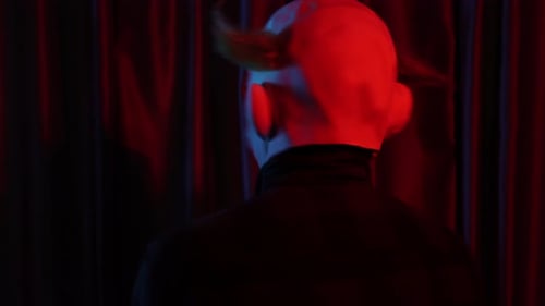 Psychopath Man with Scary Freaky Clown Mask