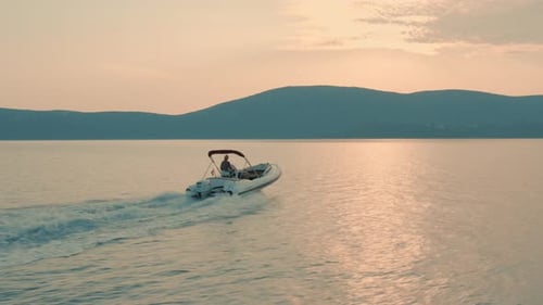 Beautiful shot of a speed boat driving on magical blue sea.