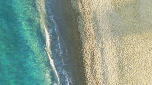 Contrast Between Sand And Ocean Water