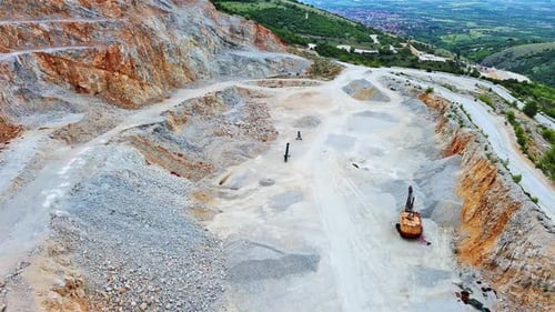 Natural Quarry is Located Near Road Against Backdrop of Rhodope Mountains and Hills with Forests and