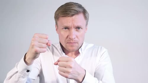 Man in Fighting Stance Ready to Box