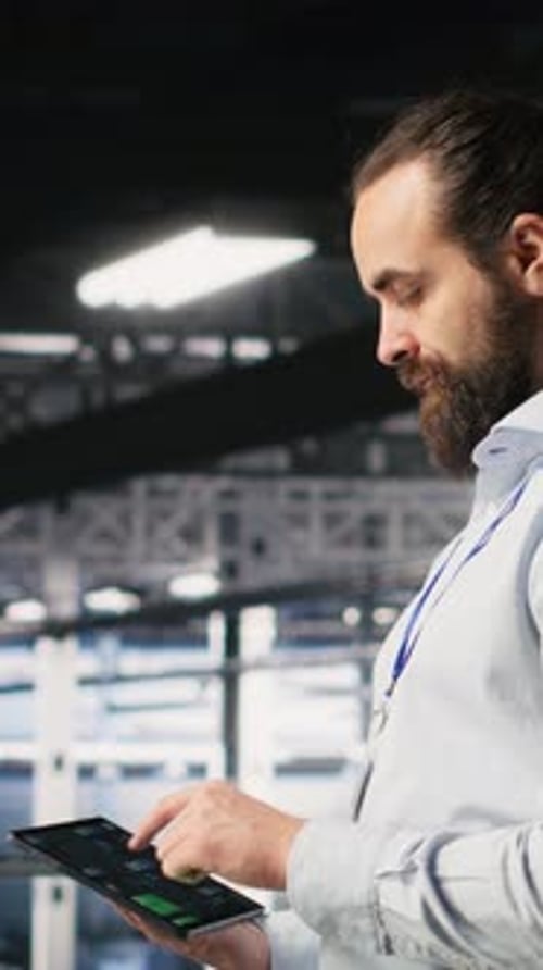 Vertical Video Data Center Computer Scientists Using Devices to Review AI LLM Visualizations