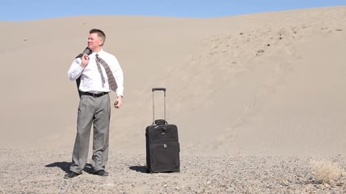 Lost Businessman in Desert Sunlight