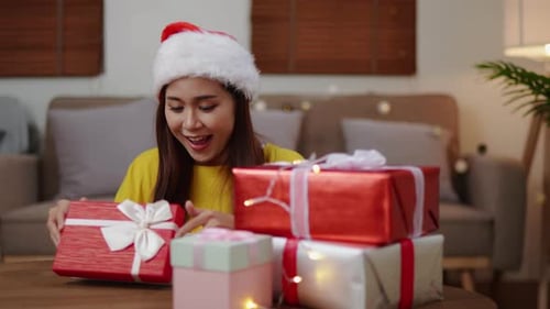 Excited Woman with Gifts in Festive Home Setting