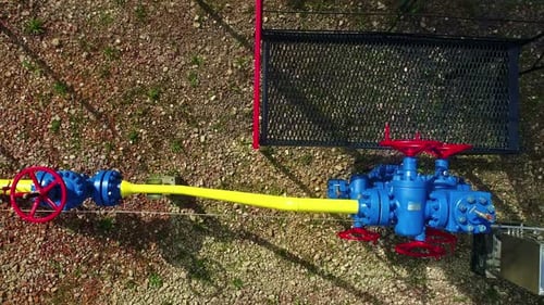 Valves and pipeline of natural gas, aerial top down view