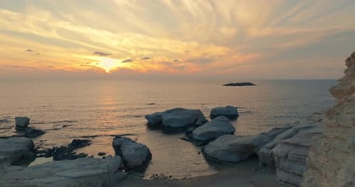 Mediterranean Majesty Aerial Views of Cyprus Island's White Cliffs at Sunset