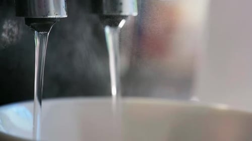 Close up of Italian Coffee with hot water and steaming black coffee. Restraint Coffee shop