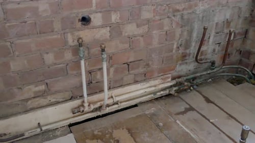 Old Room with Exposed Water Pipes, Renovation