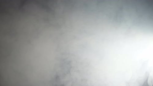 Atmospheric White Fog Flowing on Dark Background