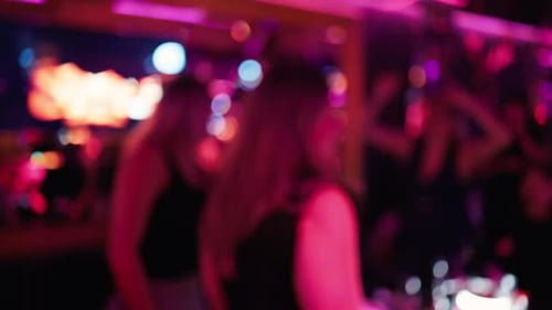 Experience a Vibrant Nightlife Scene with an Exciting Party Atmosphere in a Lively and Energetic Bar