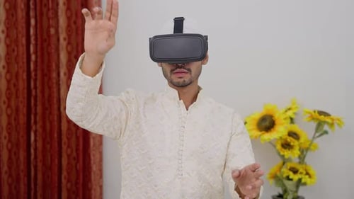 Muslim Man Zooming and Using Vertual Computer Through VR Headset