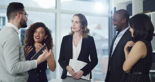 Diverse Colleagues Collaborating in Modern Office