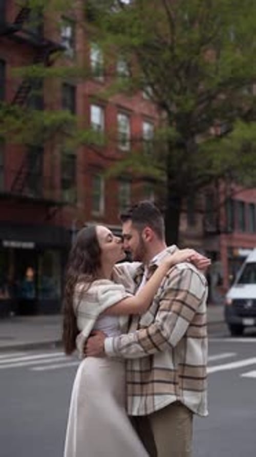 Loving Couple Embracing on City Street