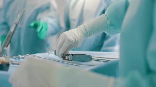 Medical Personnel Prepares Surgical Instruments in Hospital
