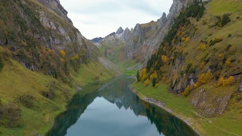 Experience the Tranquil Allure of Falensee Lake As It Reflects the Majestic Alps
