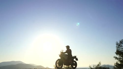 Enduro Pilot Rider With Sunset