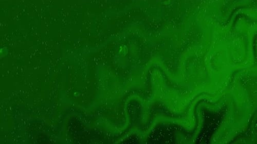 Animated Emerald Green Gradient Flowing Background with Liquid Texture and Sparkling Particles