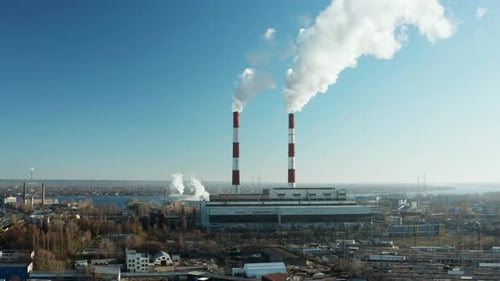 Pollution of the environment: a pipe with smoke. Power Plant.