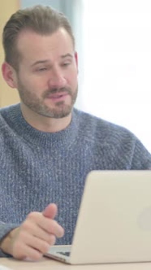 Man on Video Call With Laptop Indoors