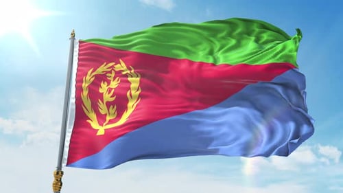 Eritrea Flag Waving in Wind Against Blue Sky Background