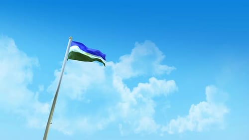 Generic Flag Waving Dynamically Against Blue Sky