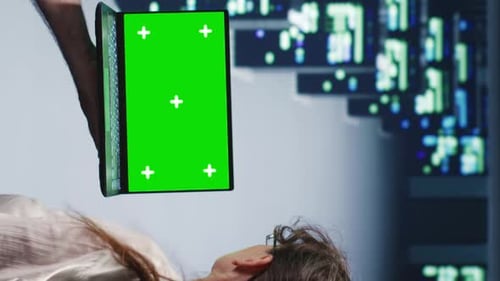 Laptop Green Screen over Prone Figure Portrait