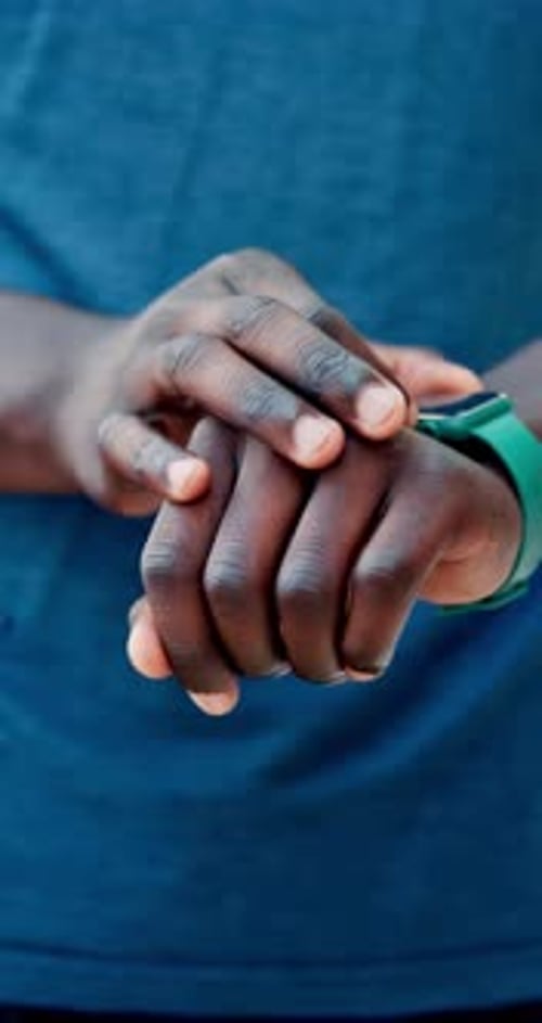 Man Interacts with Smartwatch