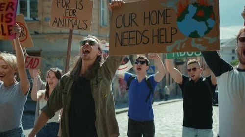 Group of Young Adults Marching in Protest