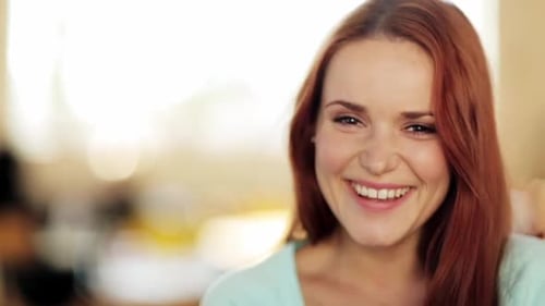 Smiling Woman Close Up In Bright Indoor Setting