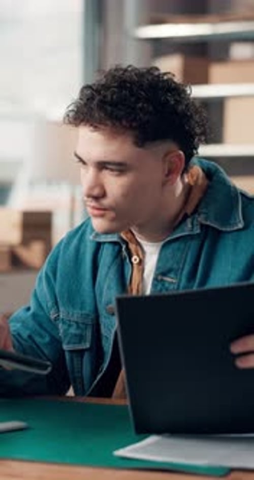 Laptop, research and shipping with man in warehouse for delivery schedule