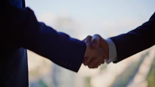 Business Handshake Symbolizing Agreement and Partnership