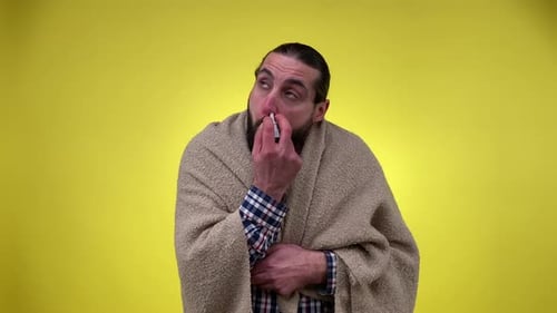Sick Mid Adult Man Using Nasal Spray Runny Nose Isolated Yellow