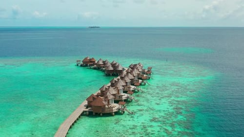 Beach Travel Vacation Tahiti Hotel Overwater Bungalows Luxury Resort in Coral Reef Lagoon Ocean