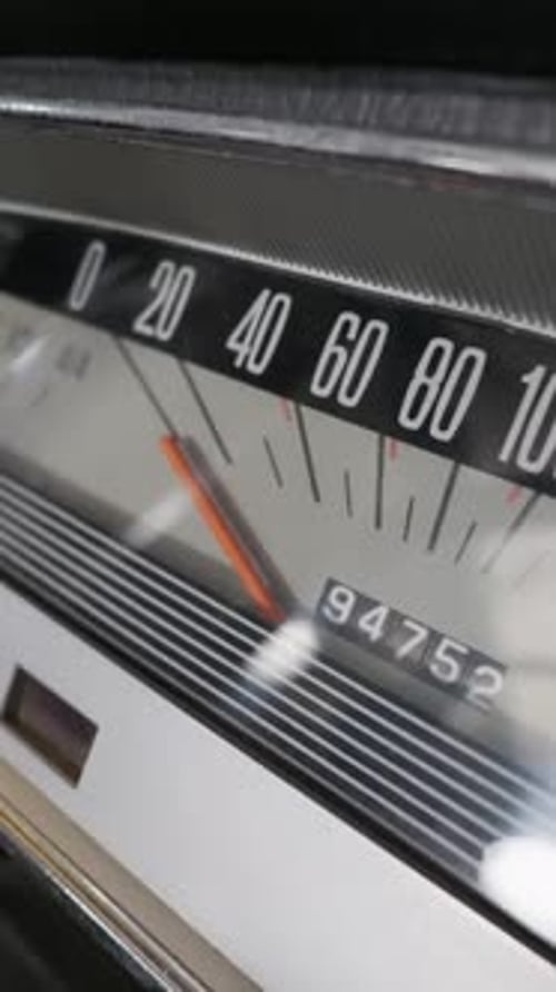 Vintage Classic Car Speedometer on Dashboard Showing Zero Speed and Odometer