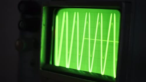 Vintage Oscilloscope Displaying Signal