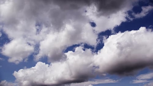 A Peaceful View Of White Clouds Gracefully Drifting