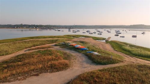 Aerial view of boats and bay at sunrise. Wellfleet, Cape Cod, USA.