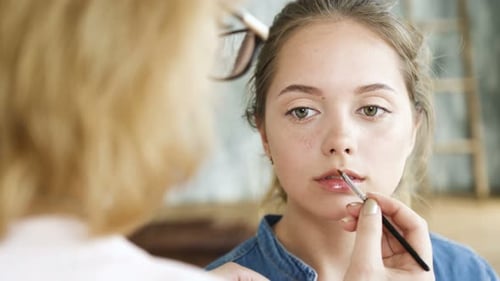 Teen Girl Having Lips Done With Lip Liner
