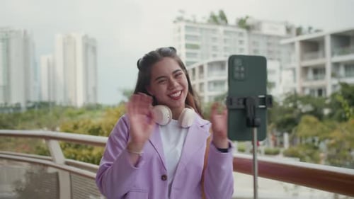 Young Woman Vlogging in Urban Environment