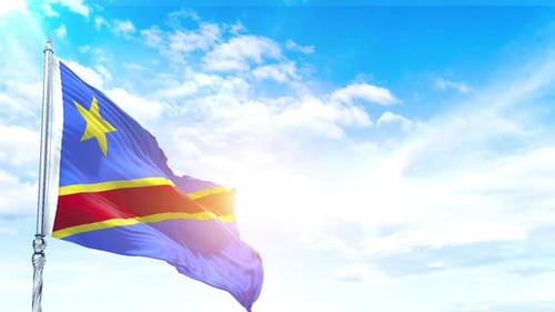 Democratic Republic of Congo Flag Waving in Bright Blue Sky