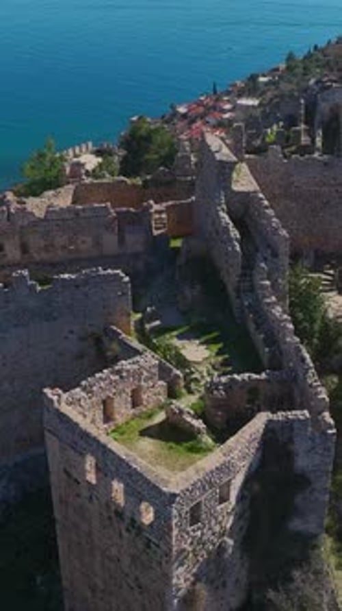 Vertical Video Majestic Fortress on a Hill in Alanya With Views of the City and Bright Blue Sea
