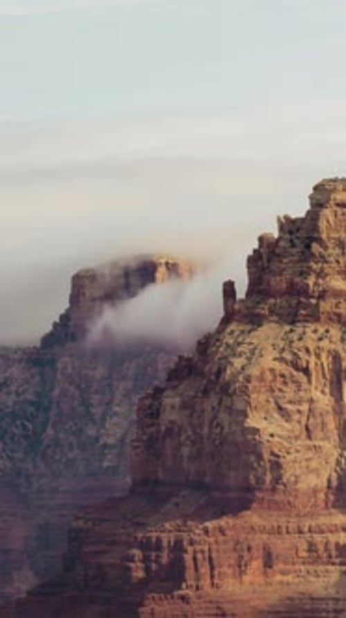 Vertical Grand Canyon Clouds Over Cliff
