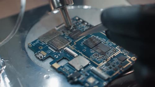 Close Up of Circuit Board Repair