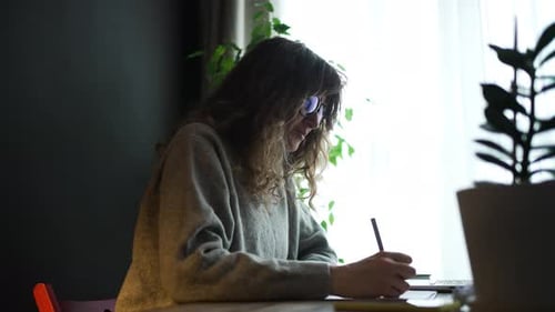 Young Woman Getting Frustrated While Working at Home