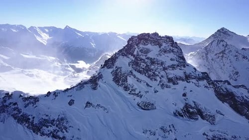 Aerial flight above stunning Alps.