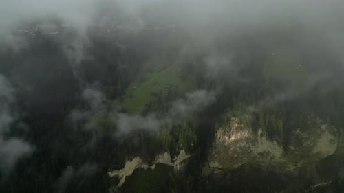 Drone Captures Green Hills Majestic Mountains and Pure Landscape in Interlaken Switzerland