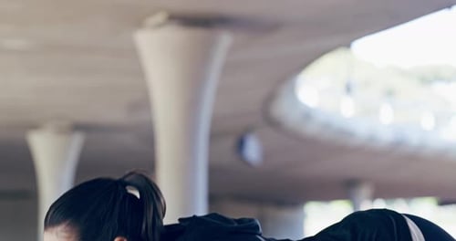 Athletic Woman Doing Pushups Under Overpass